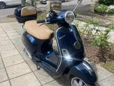 Vespa LX Vespa LX 125 bleu marine avec Top Case (2009) - Photo 1