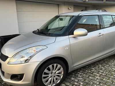 Suzuki Swift 1.3 GLX (2010) - Photo 1