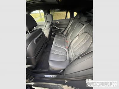 BMW X6M 60i (2023) - Photo 10