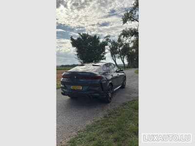 BMW X6M 60i (2023) - Photo 7