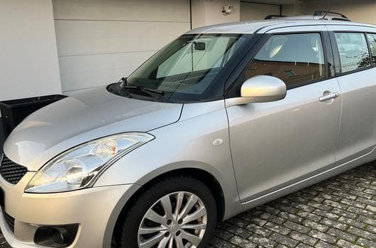 Suzuki Swift 1.3 GLX (2010) - Photo 1