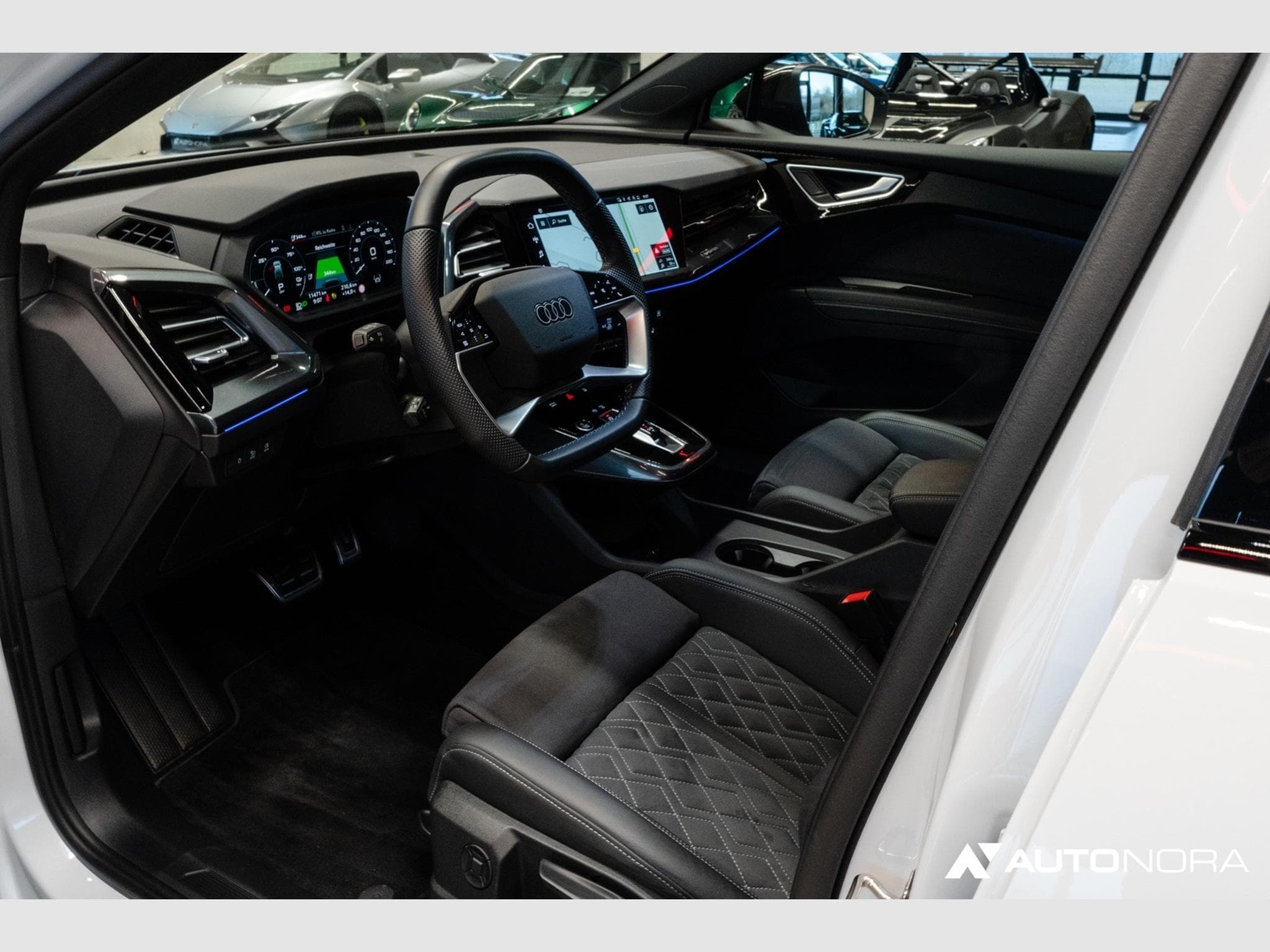 Audi Q4 e-tron 55 quattro S-Line Edition (2024) - Photo 12