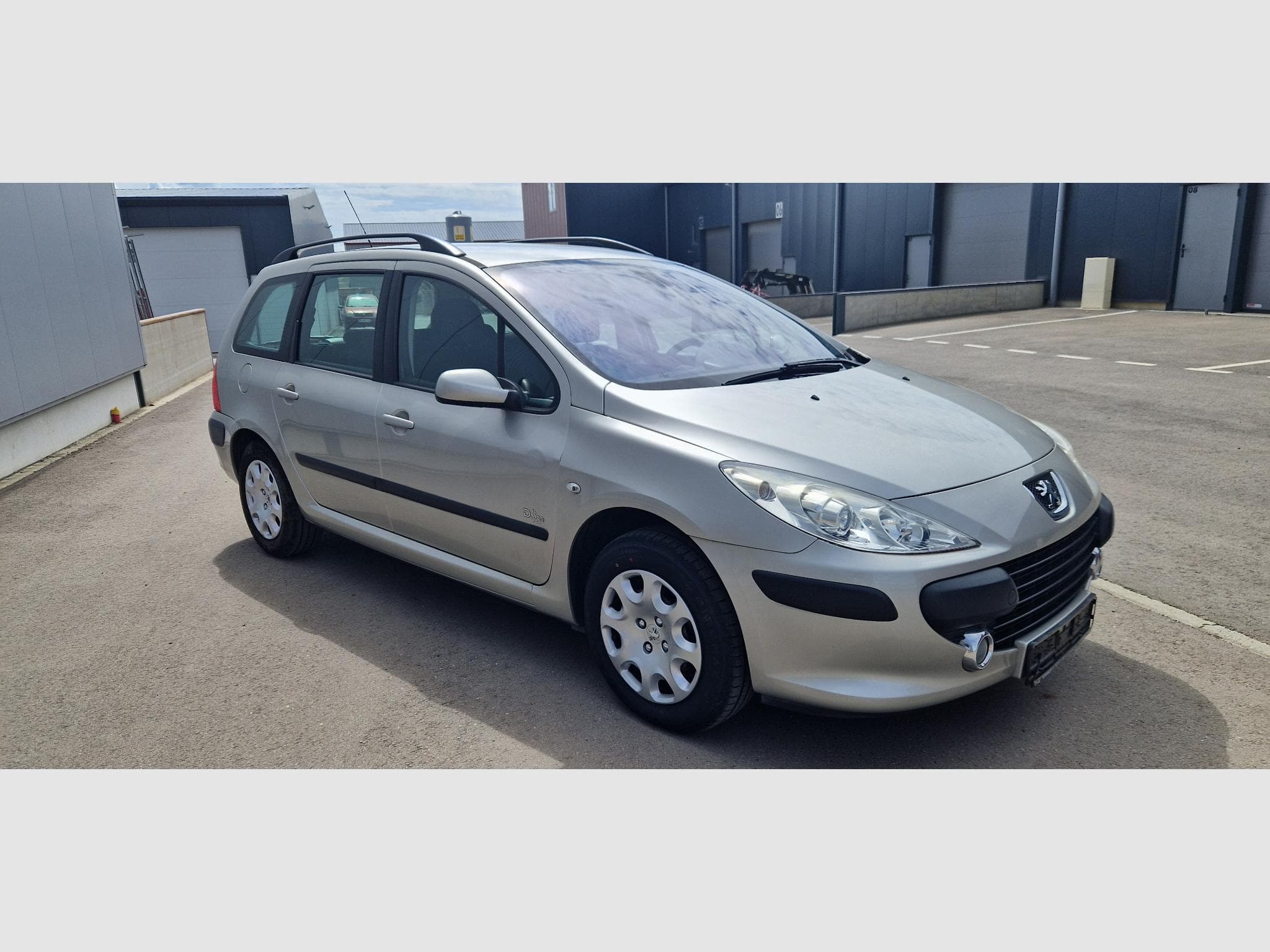 Peugeot 307 SW 1.6 Hdi design 90ch (2007) - Photo 7