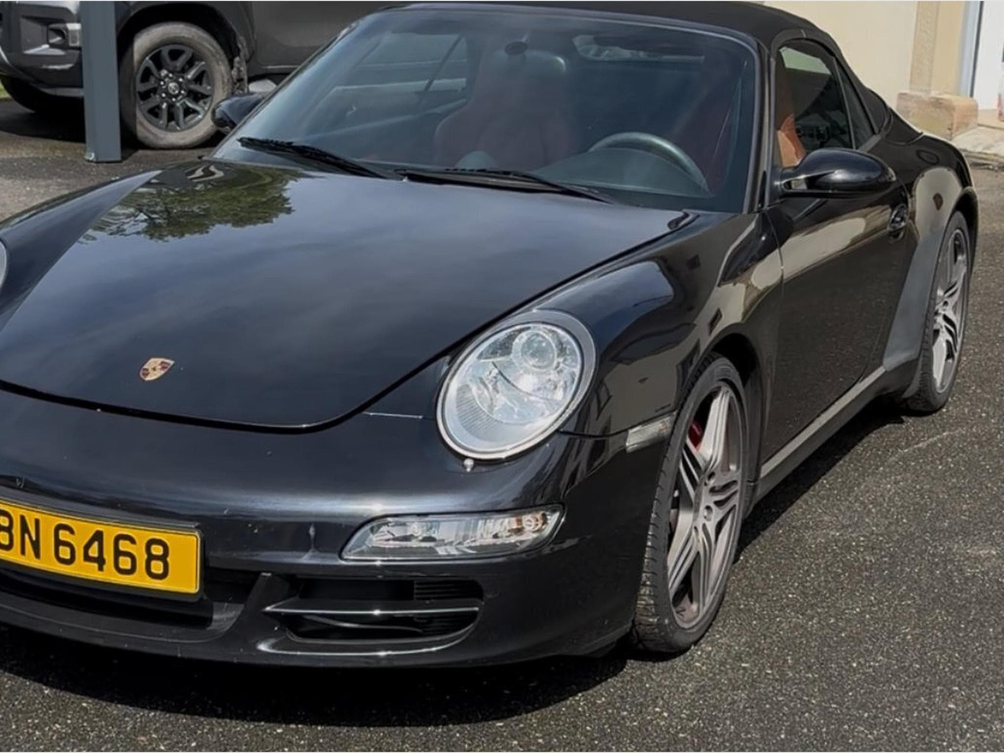 Porsche 911 Cabriolet noir interieur cuir brique (2009) - Photo 1