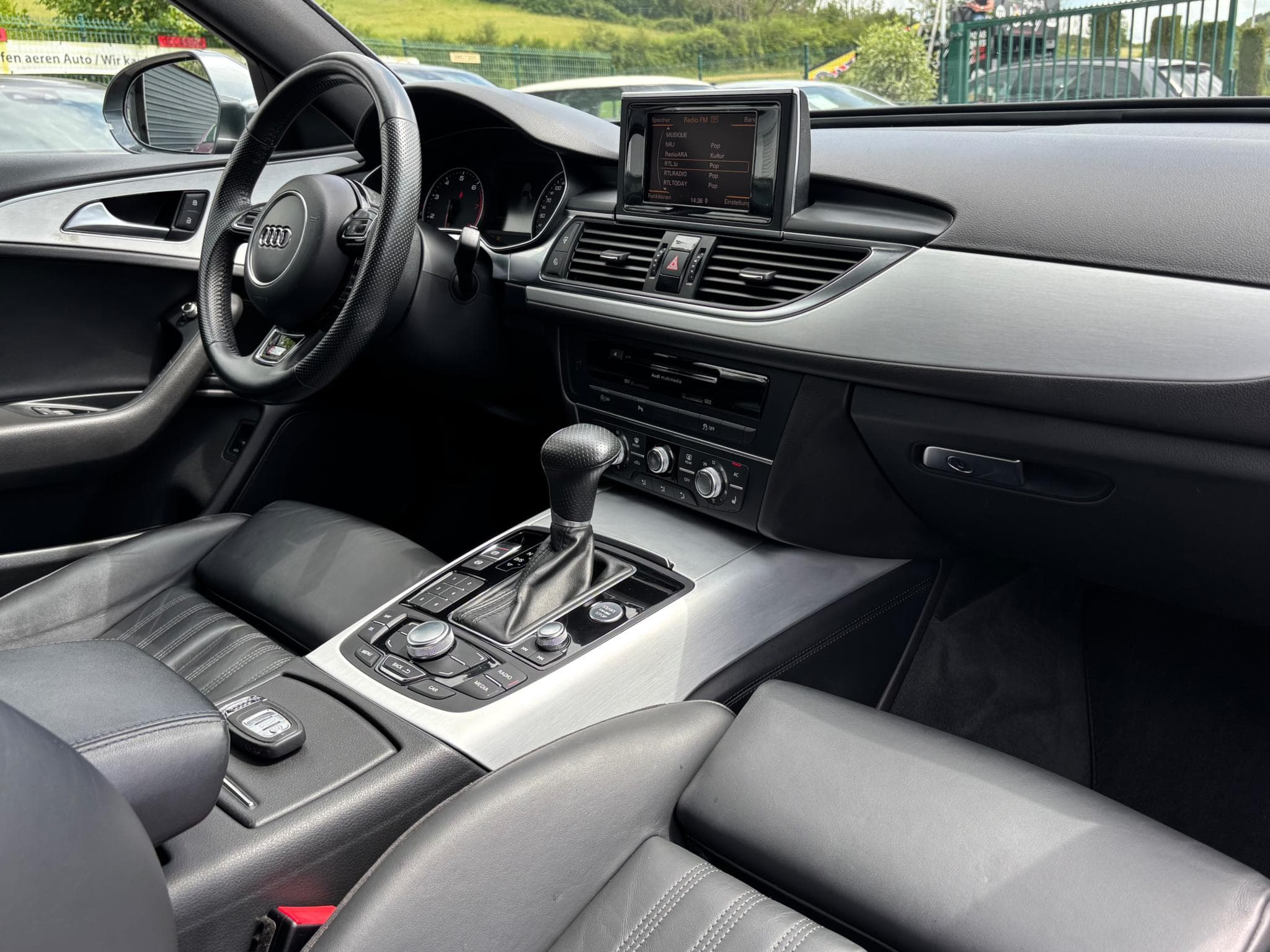 Audi A6 AVANT 2.0 TFSI 180ch S-Line (2013) - Photo 11
