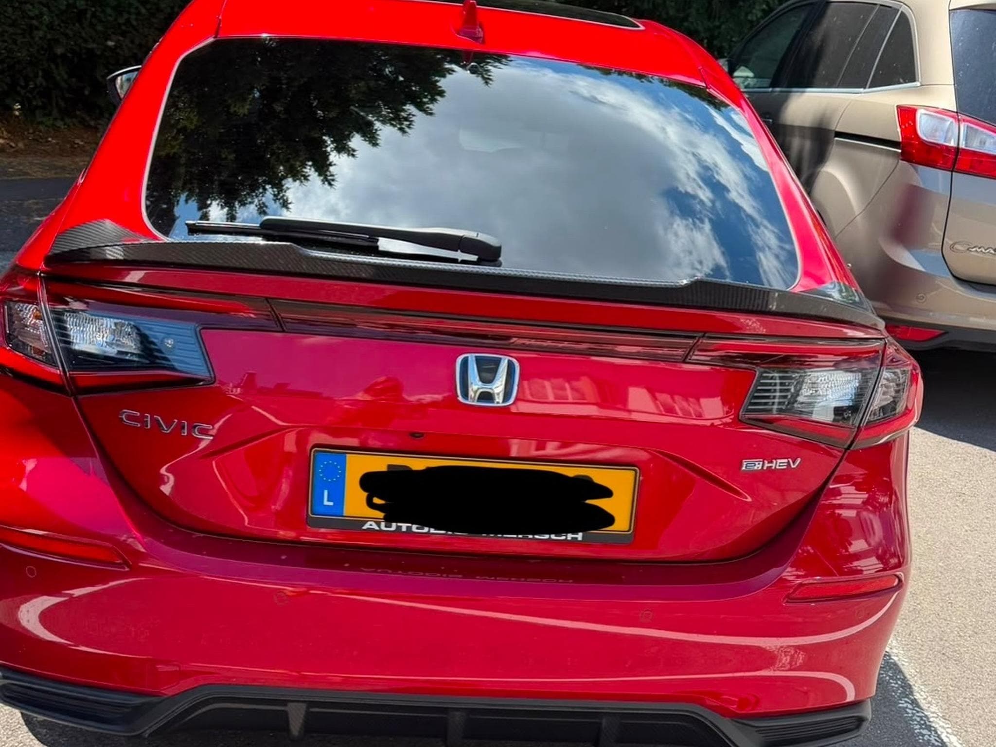 Honda Civic e:HEV Advance (2023) - Photo 8