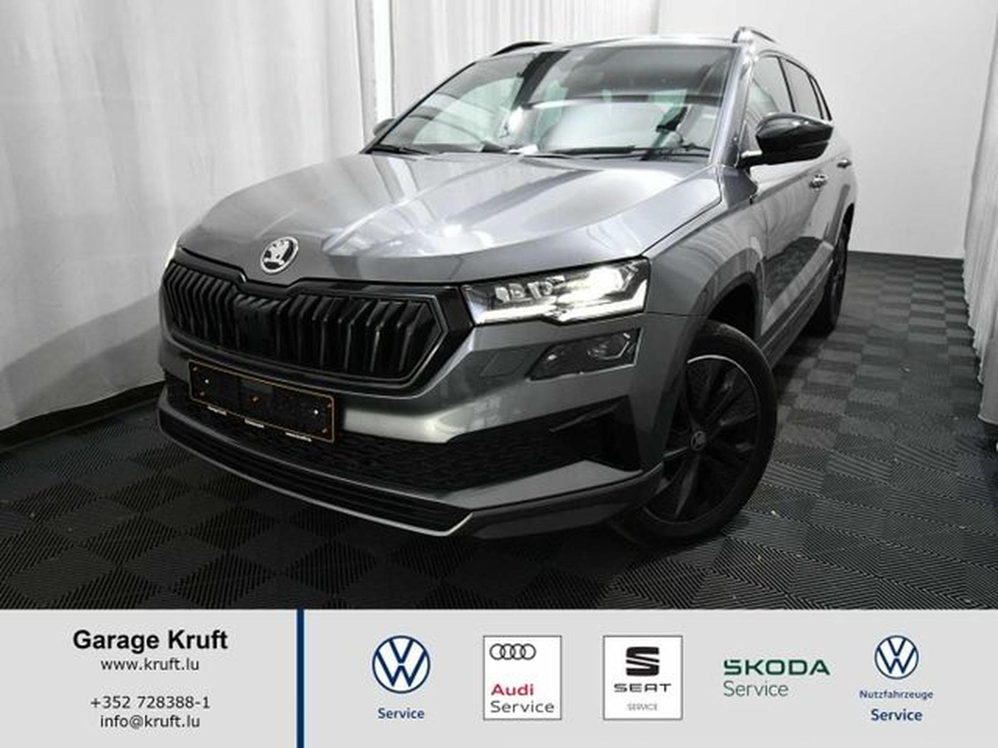 Skoda Karoq Karoq 1.5 TSI DSG Sportline - AHK, Navi, Kamera (2025) - Foto 1