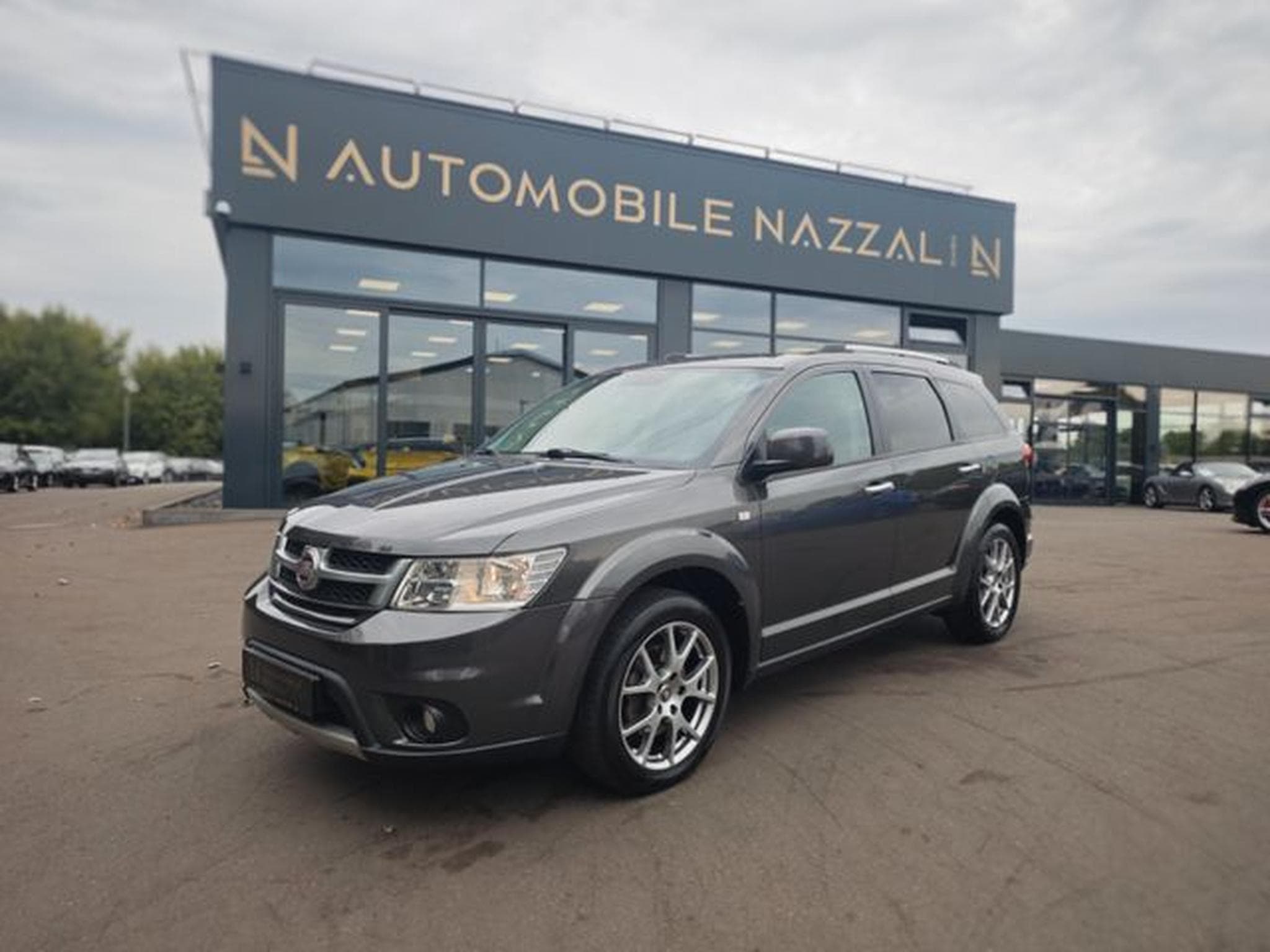 Fiat Freemont FREEMONT LOUNGE AWD *2.HD*AUT*7 SITZE*NAVI*KAM* (2016) - Photo 1