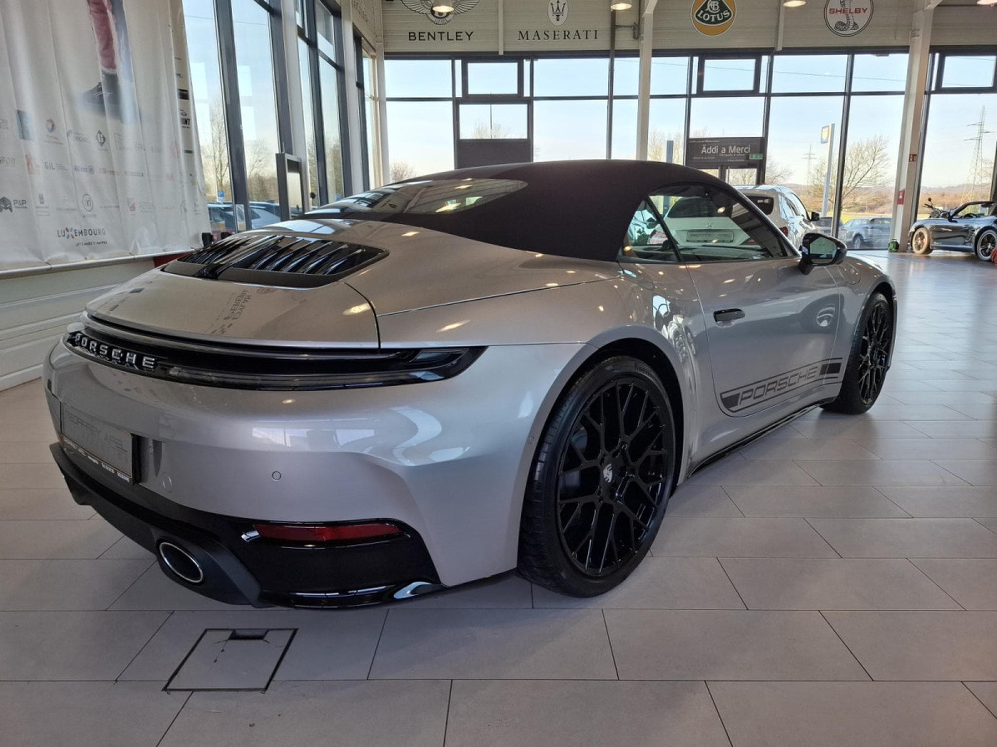 Porsche 911 FACELIFT CARRERA CABRIO PACK CHRONO BOSE CUIR NAVI 1 HAND 36 (2025) - Photo 3