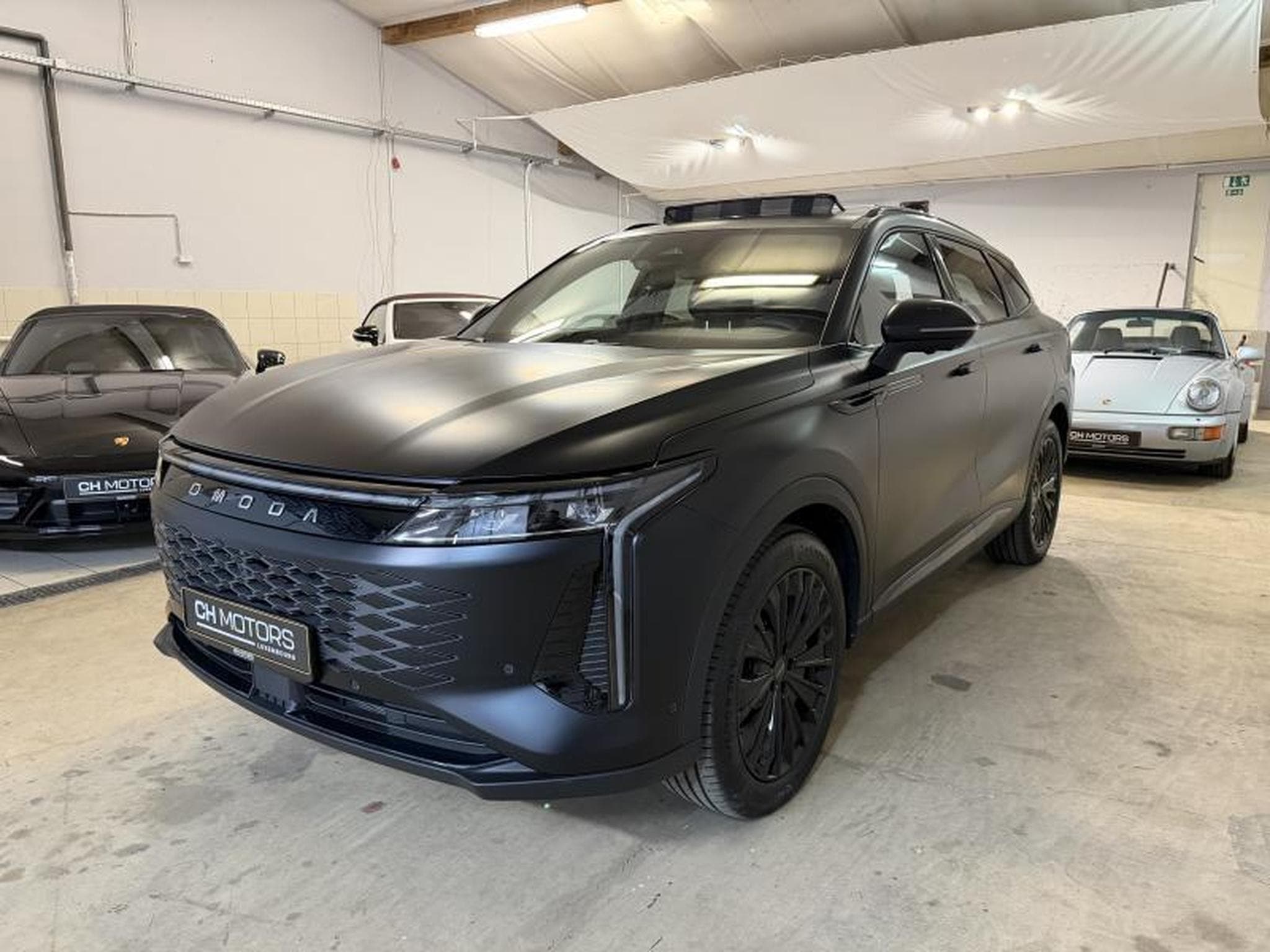OMODA 9 SHS AWD PHEV Premium BlacK Edition (2026) - Photo 3