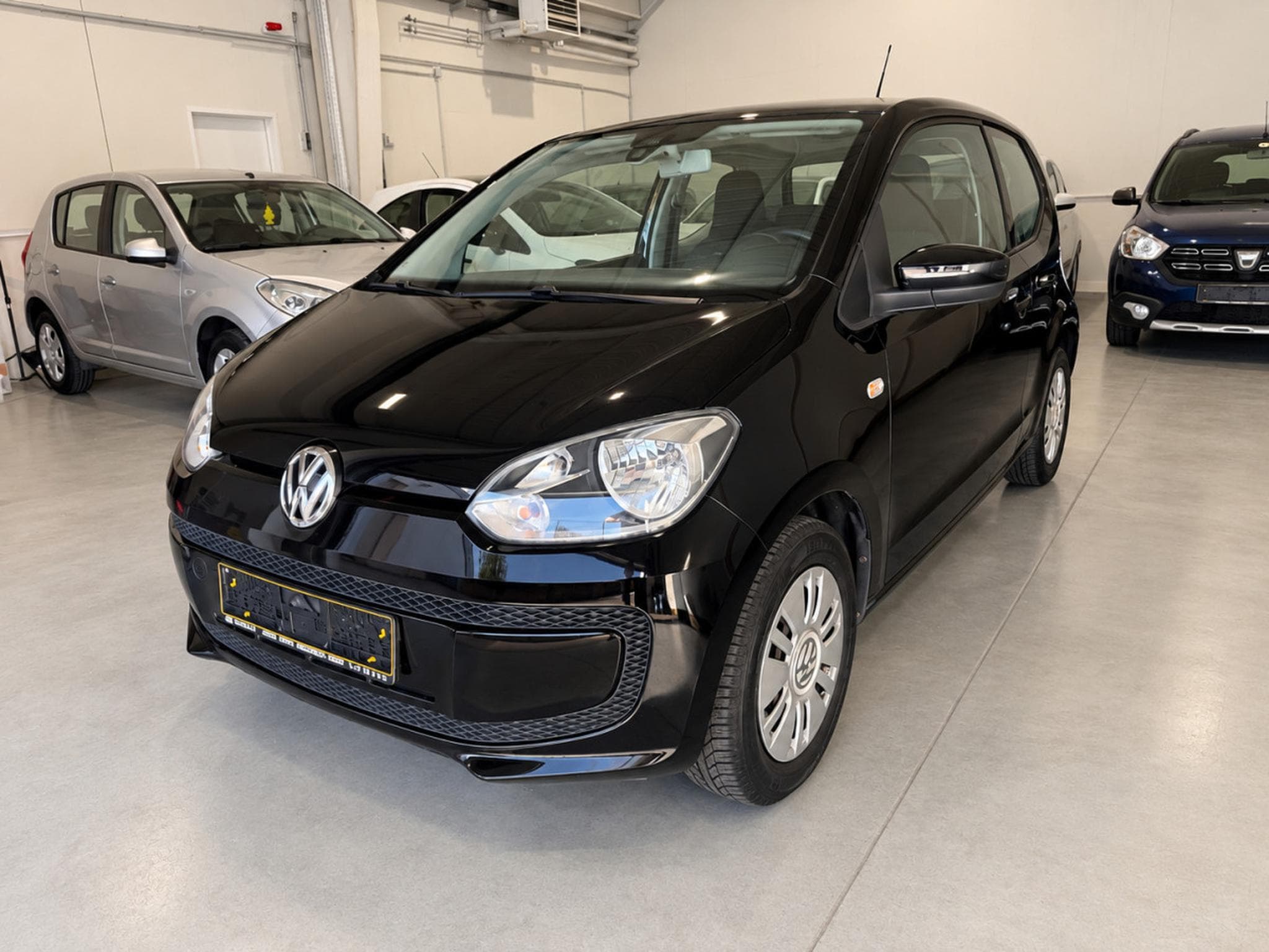 VW UP 1.0 Move Up! Clim (2012) - Foto 1