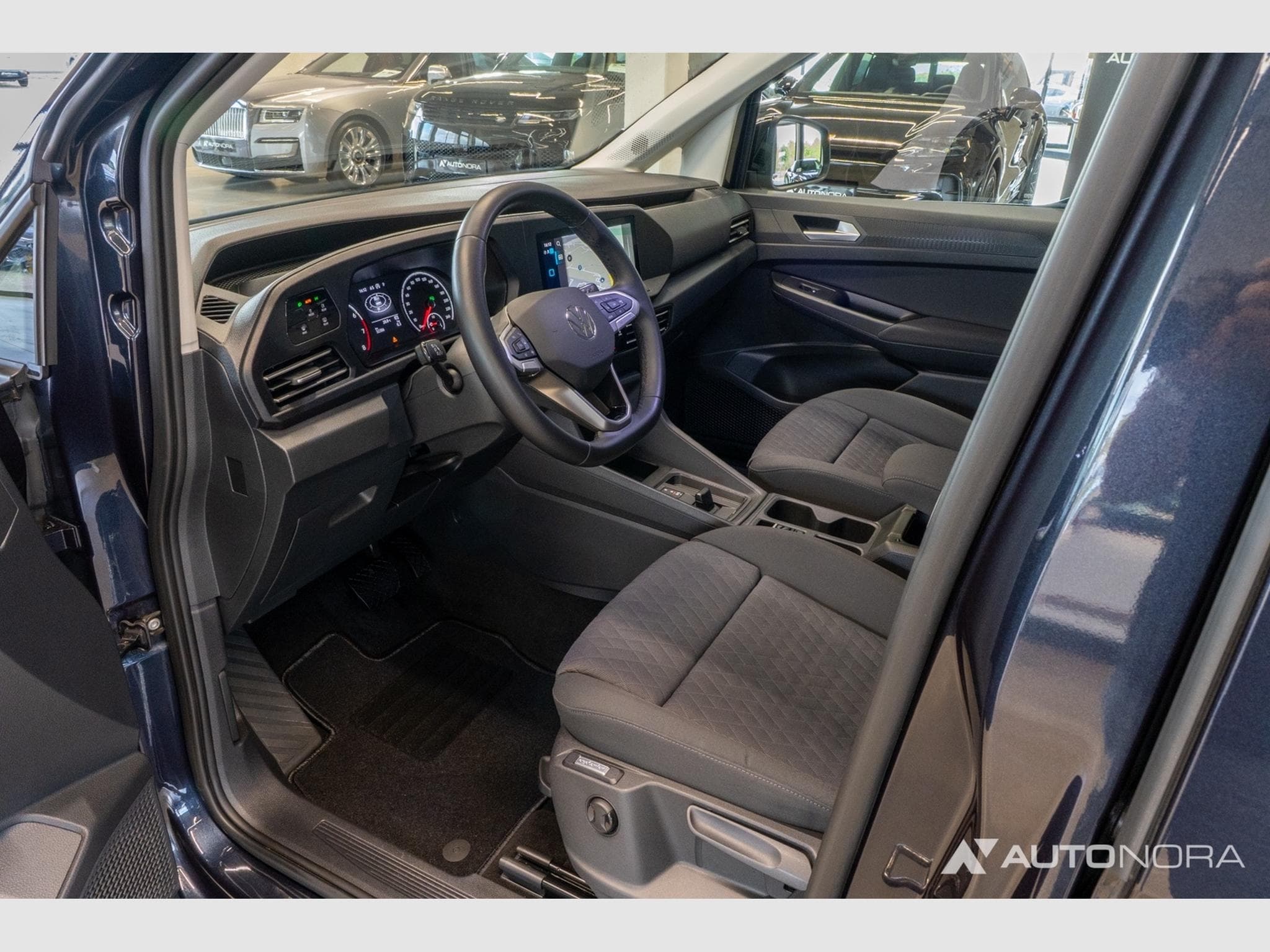 VW Caddy 1.5 TSI Life (2023) - Photo 12