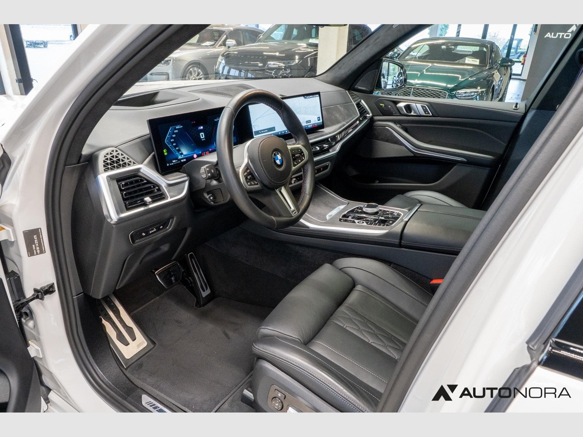 BMW X7 M60i xDrive (2025) - Photo 12
