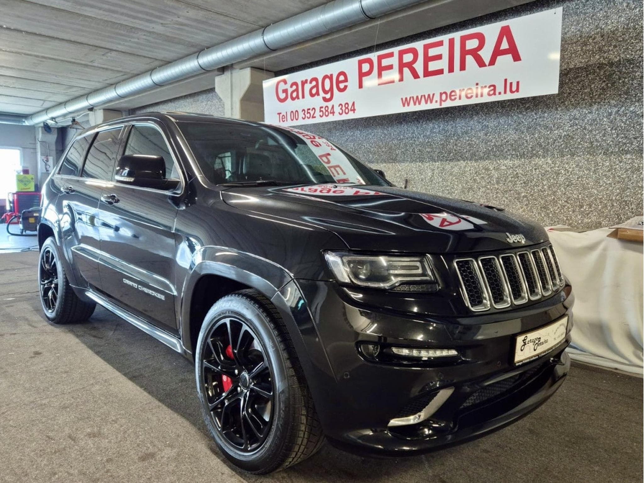 Jeep Cherokee 6.4l V8 HEMI SRT NAVI CUIR PANO 1 HAND (2015) - Foto 1