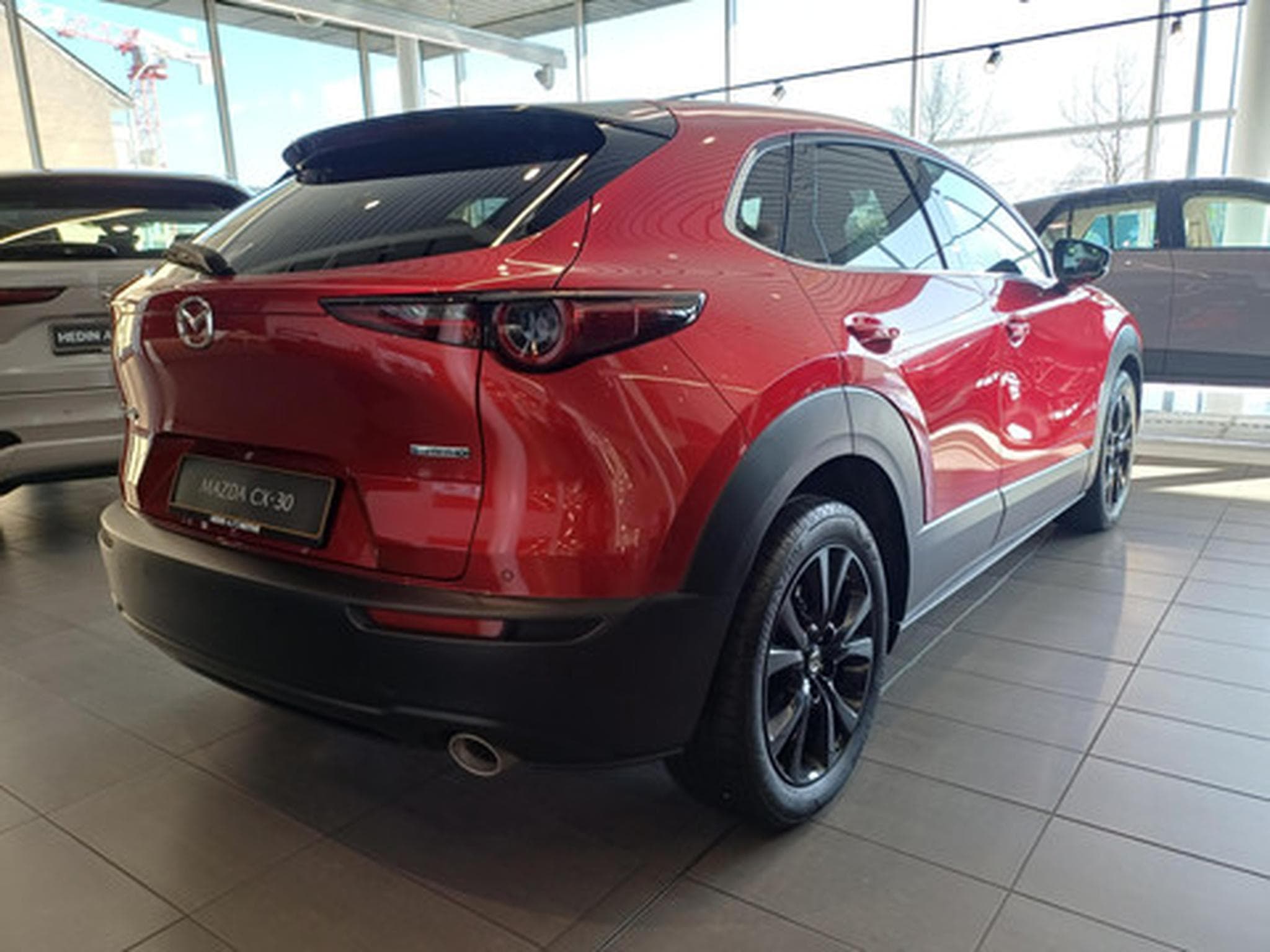 Mazda CX-30 MY2024 2.0L e-Skyactiv X 186 hp 6MT Exclusive Line (2026) - Photo 4