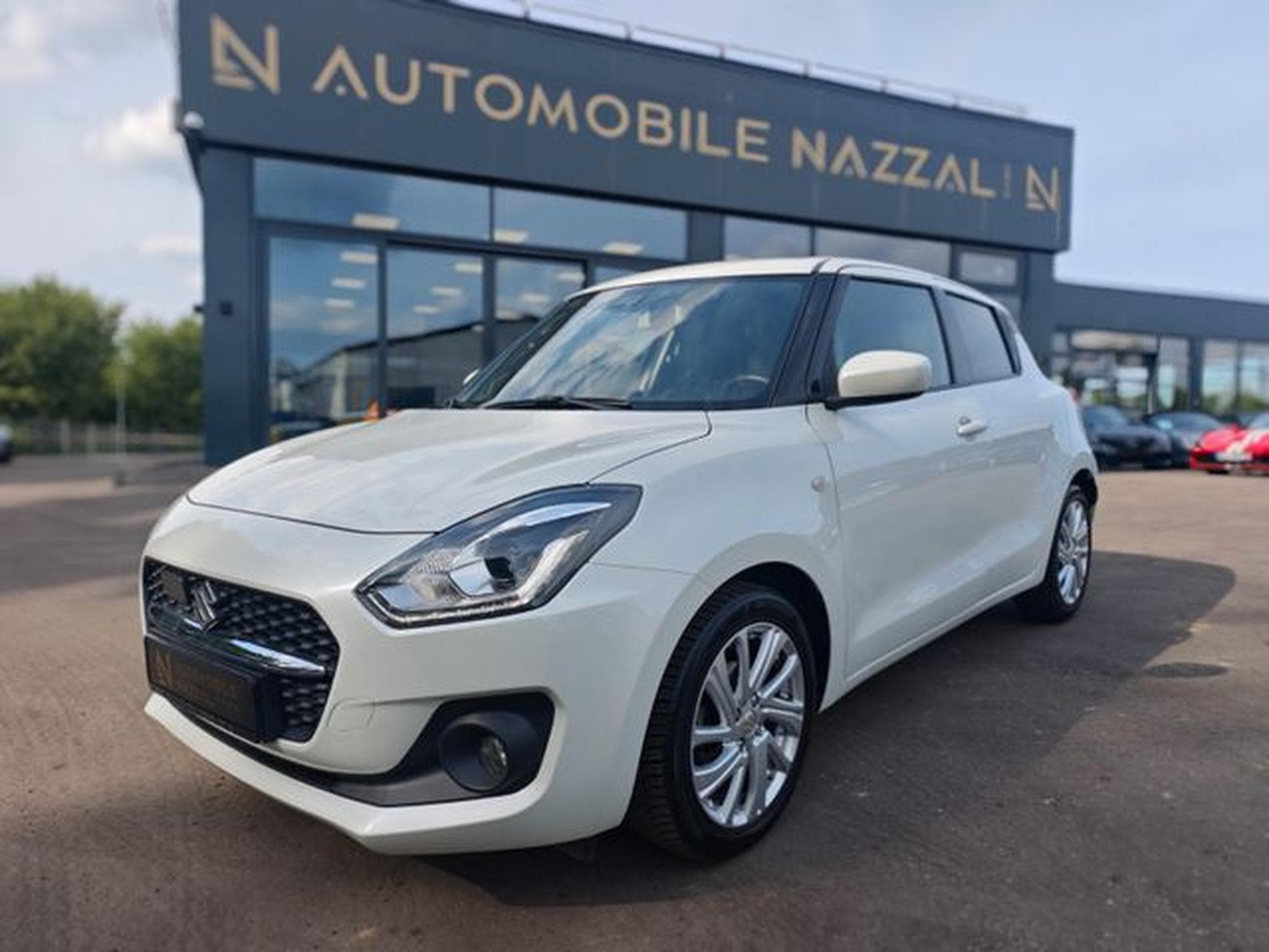 Suzuki Swift SWIFT COMFORT*AUTOMATIK*KAM*KLIMA*ALU*NAVI* (2022) - Photo 2
