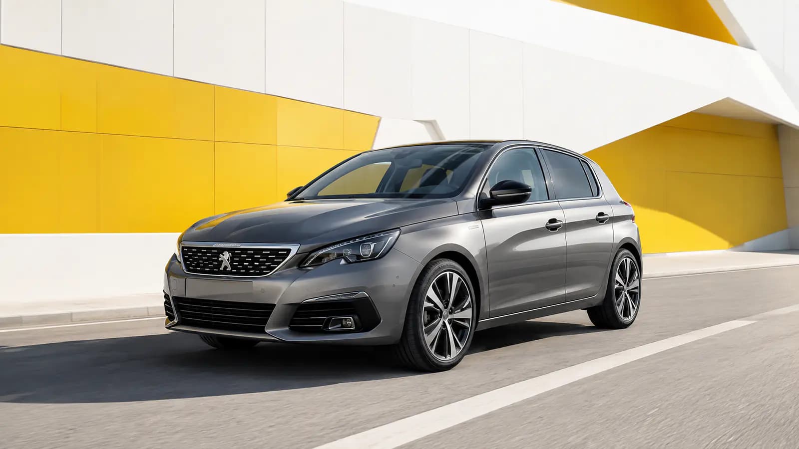 Peugeot 308 driving on a road in Luxembourg