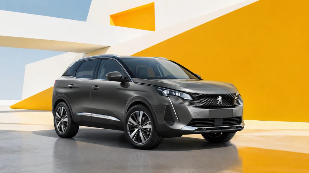 Peugeot 3008 parked beside contemporary architecture