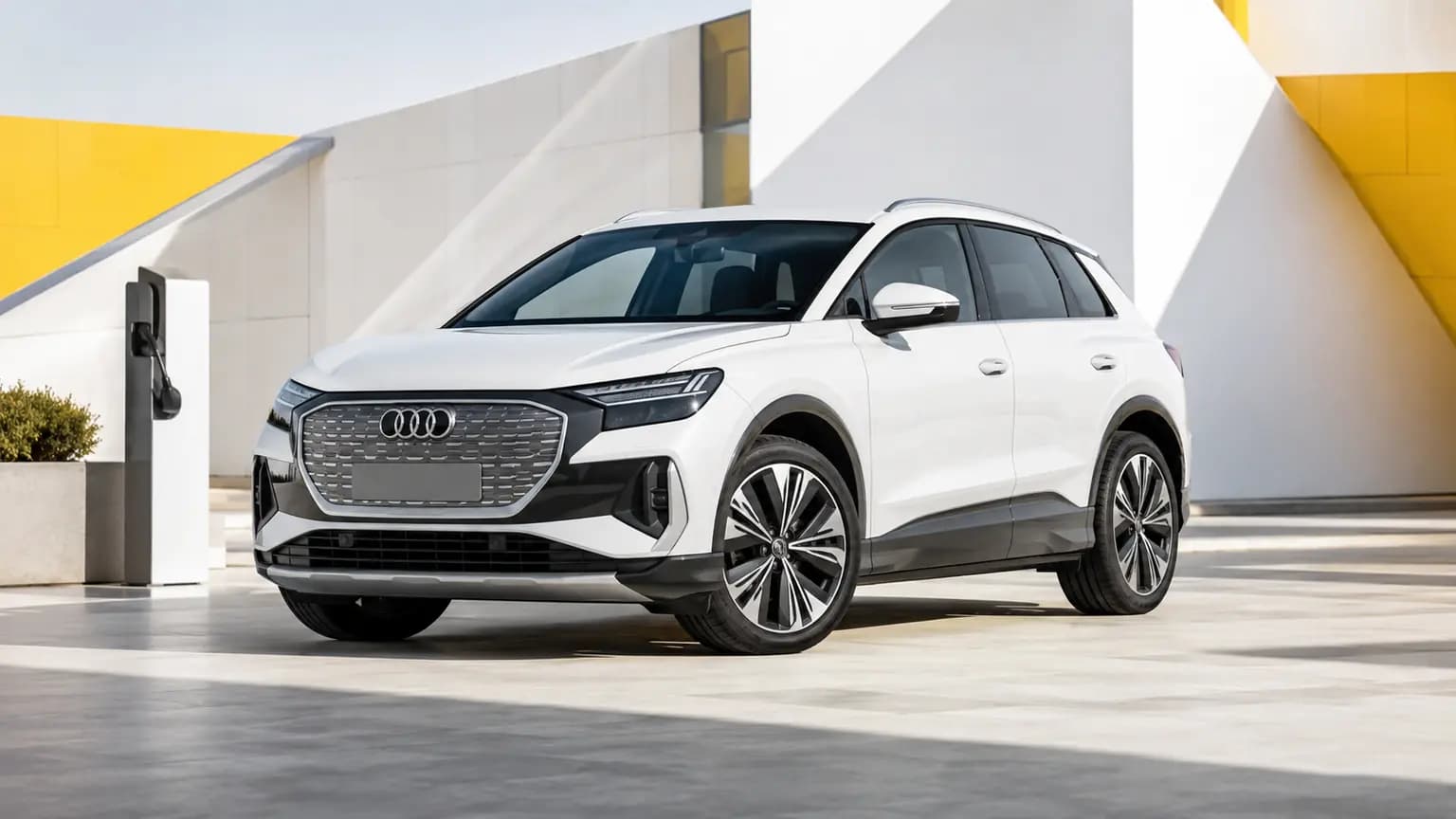 Audi Q4 e-tron electric SUV in a modern urban setting