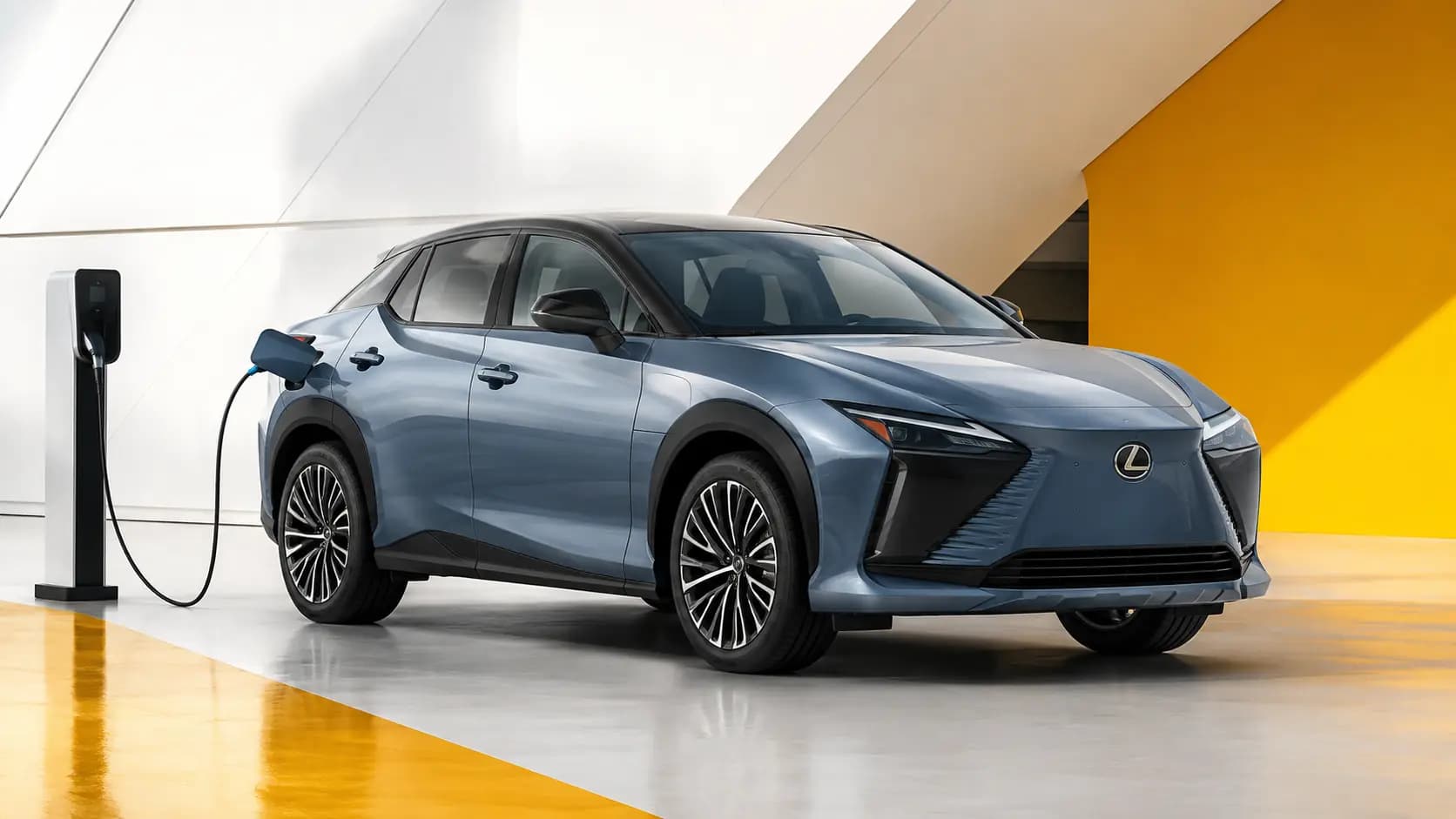 Electrified Lexus model beside a charging point