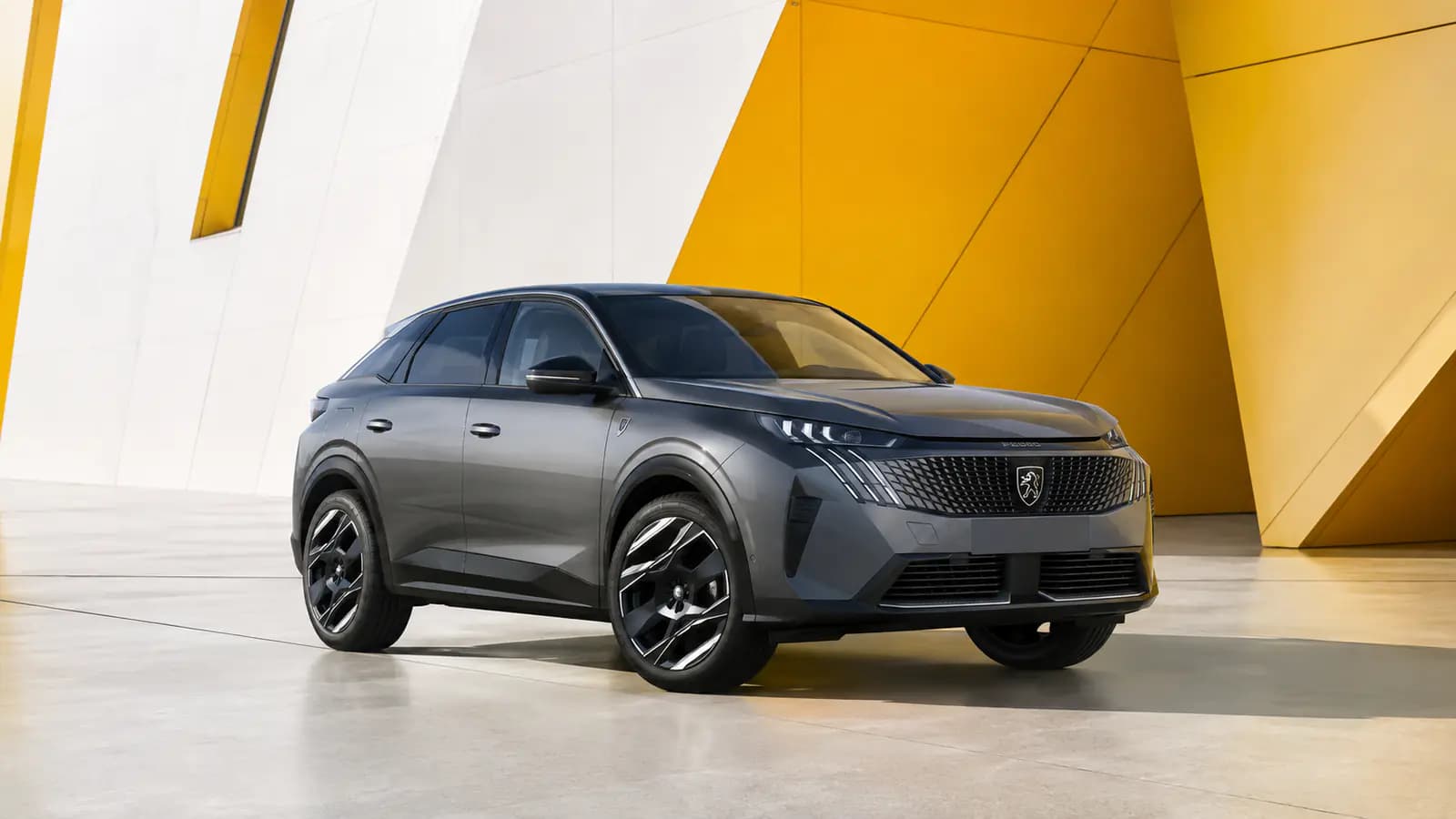 Peugeot E-3008 electric SUV in a modern urban setting