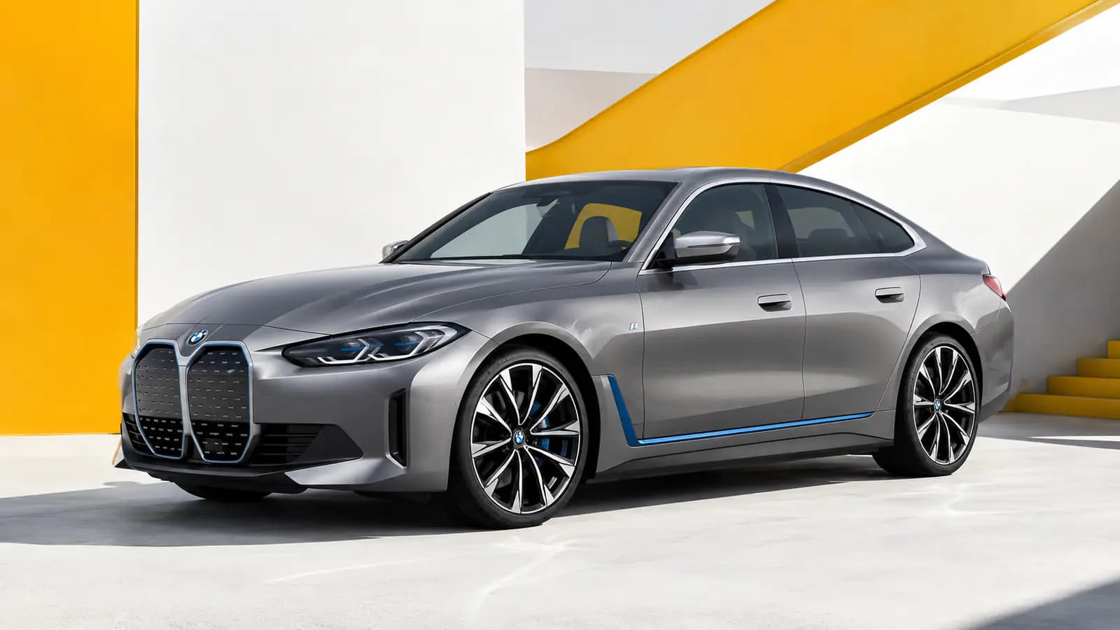 BMW i4 electric car in a modern urban setting