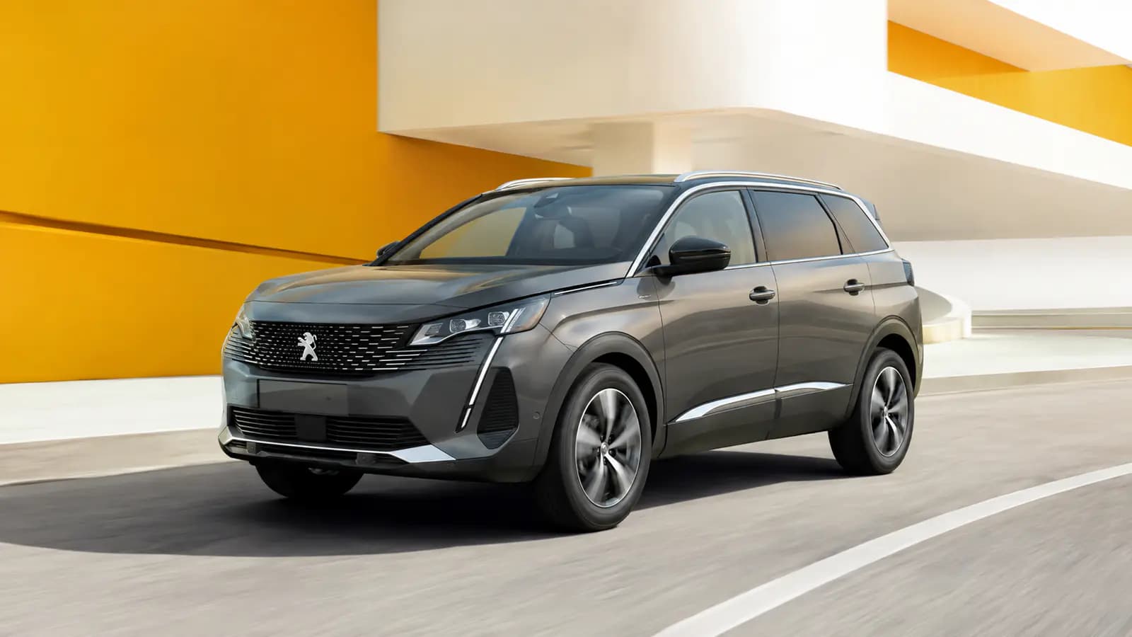 Peugeot 5008 driving on a scenic road in Luxembourg