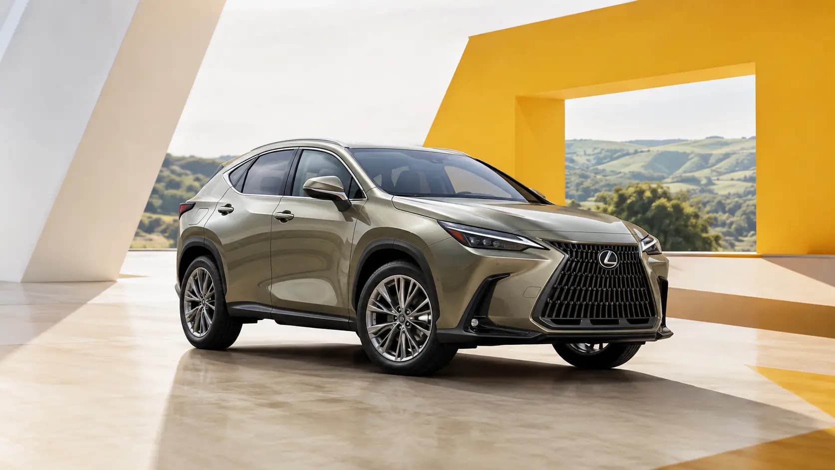 Lexus NX driving on a scenic Luxembourg road
