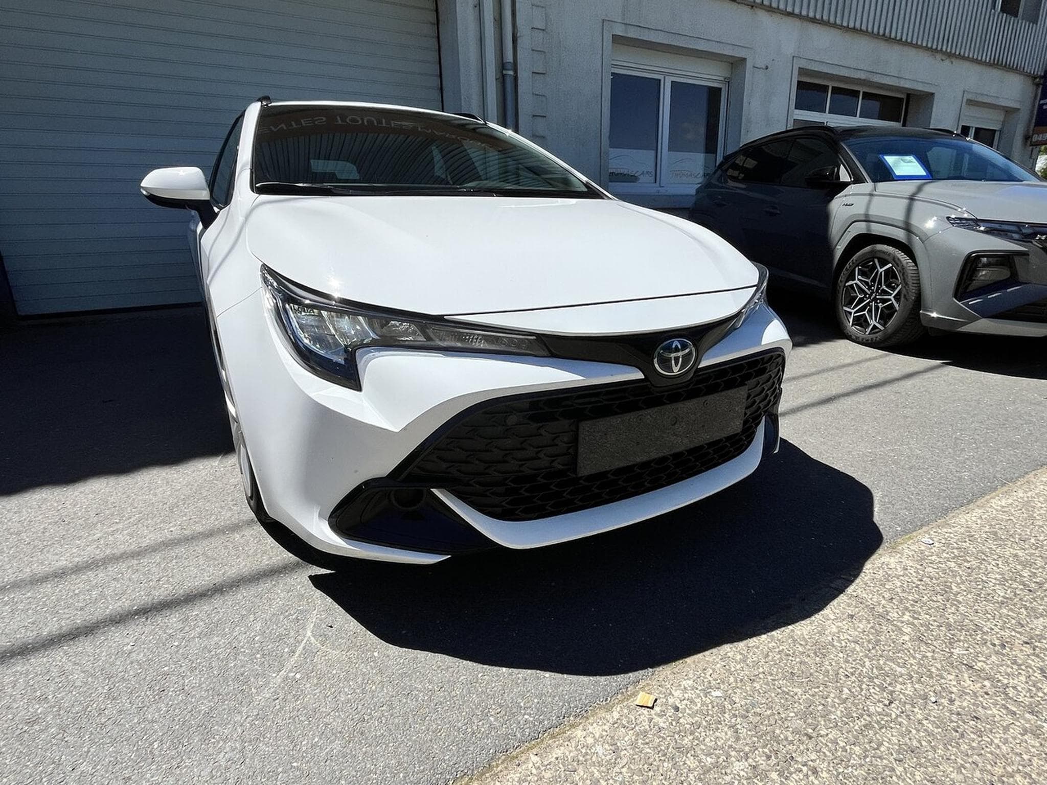 Toyota Corolla TOURING HYBRIDE 122 CH - LED -Caméra - Cruise - Garantie - (2024) - Photo 10
