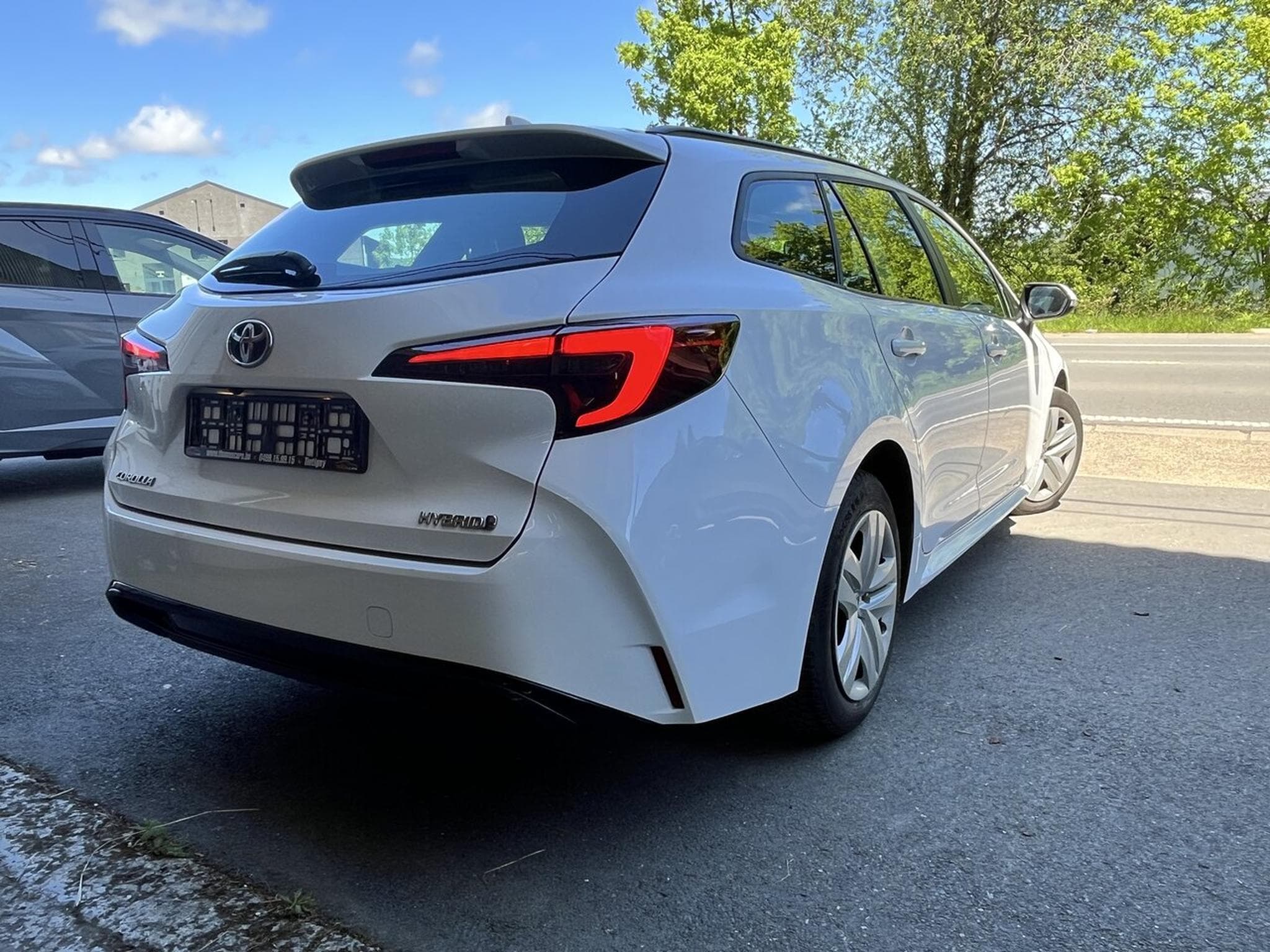 Toyota Corolla TOURING HYBRIDE 122 CH - LED -Caméra - Cruise - Garantie - (2024) - Photo 6
