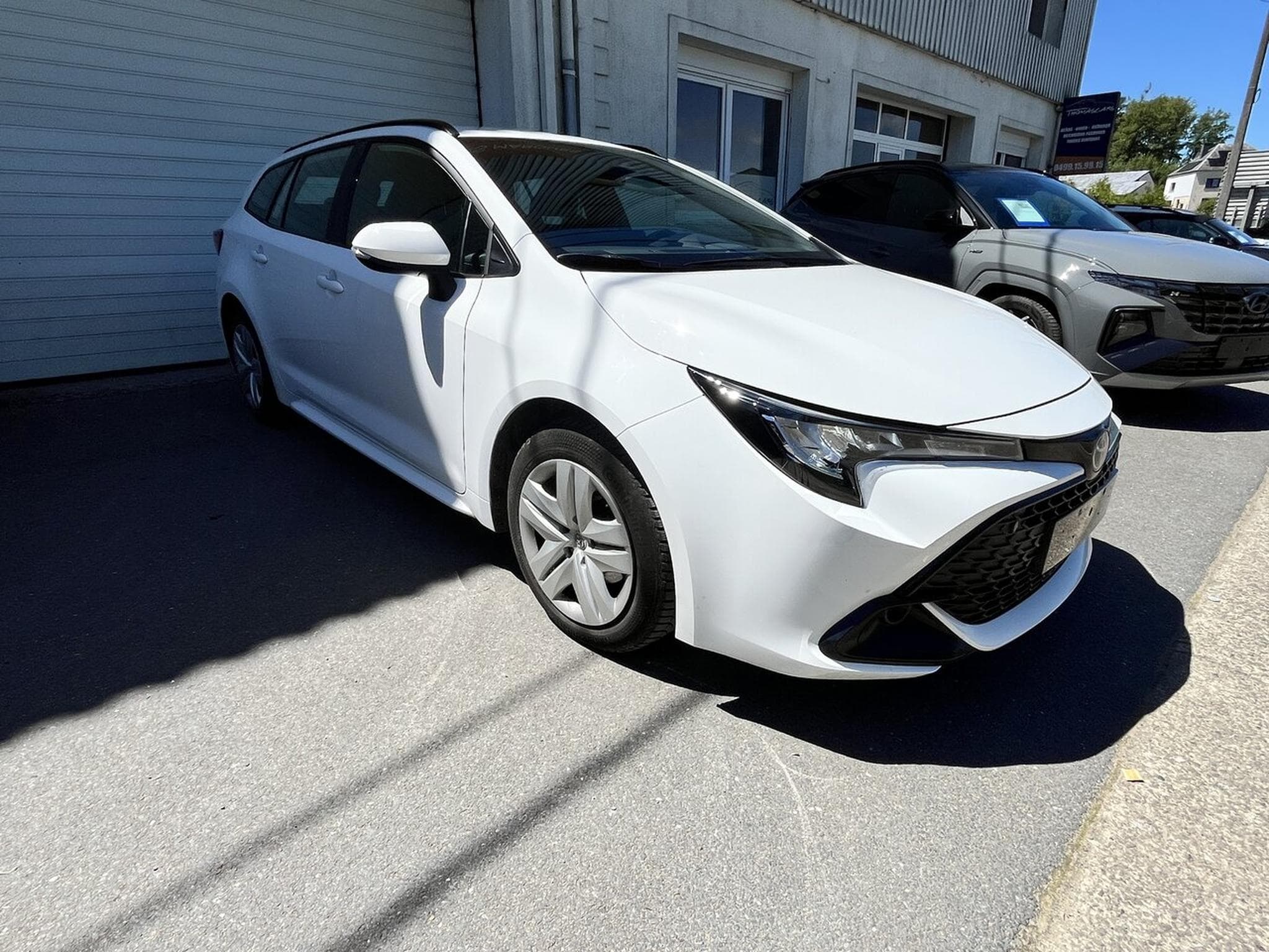 Toyota Corolla TOURING HYBRIDE 122 CH - LED -Caméra - Cruise - Garantie - (2024) - Photo 9